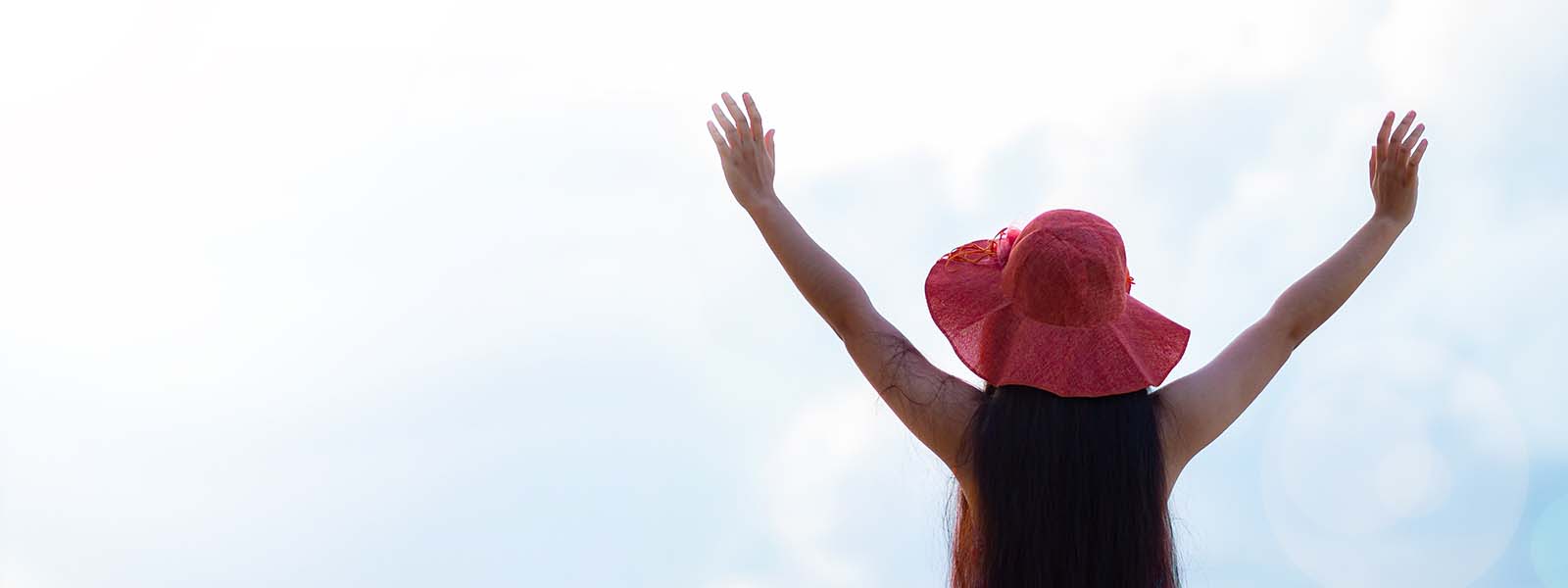 Healthy woman raised hands for praise